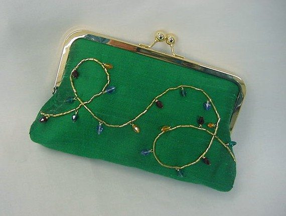 How awesome is this clutch?  Twinkling lights hand-sewn using Swarovski crystals!