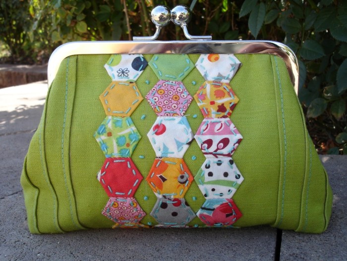 This clutch is made by Elaine.  A little bee brooch would be brillant!